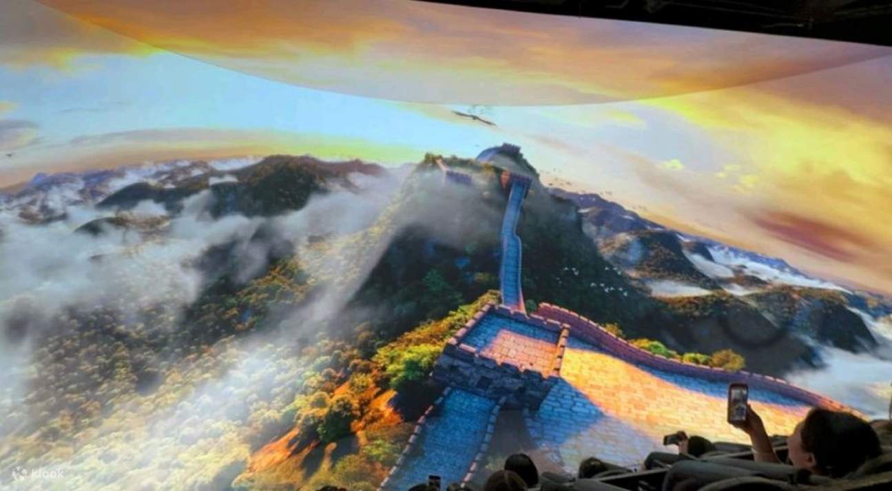 A combination of close-up details of the city wall and the layers of distant mountains